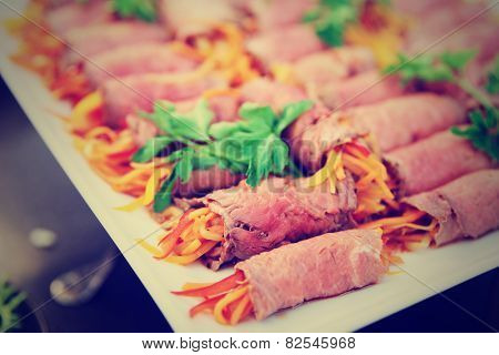 Rolls with roastbeef and vegetables, limited focus, toned image