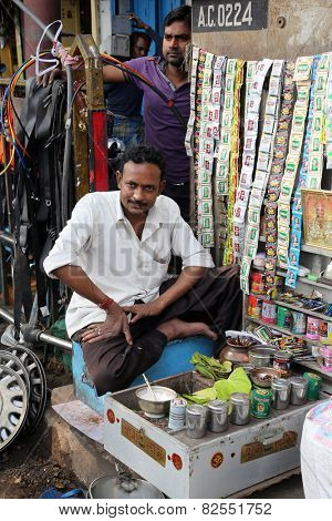 KOLKATA, INDIA - FEBRUARY 08: Streets of Kolkata. Making Paan in Kolkata. Areca nut and spices wrapped in a betel leaf which is chewed and then spat out, February 08, 2014.