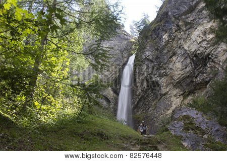 Waterfall Through Rocks In Madesimo