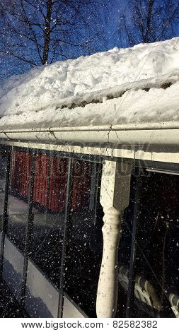 Cleaning snow from roof