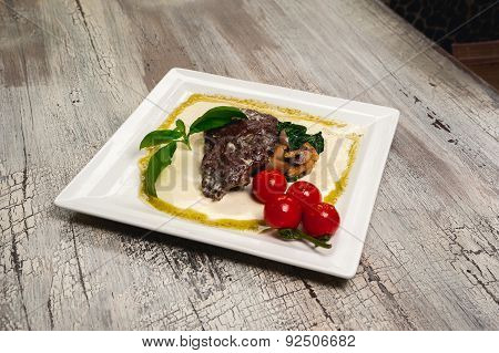 Grilled Beef Steak With Tomatoes And Mushrooms