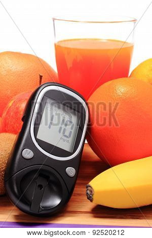 Glucometer, Fresh Natural Fruits And Glass Of Juice