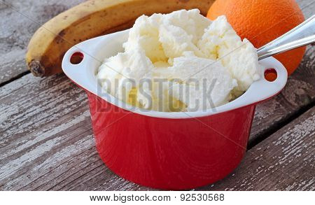 White Ice Cream In Red Bowl