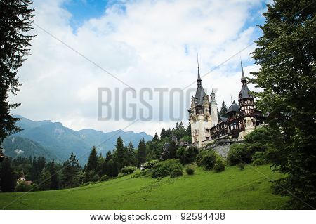 Peles Castle In The Carpathian Mountains