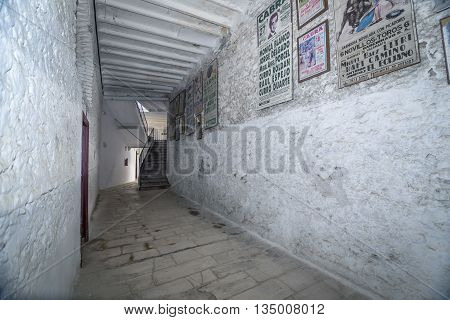 Cabra Spain - September 5 2010: Interior of bullring of Cabra is based on a popular architecture being built with masonry brick and wood debuted as a bullfighter on April 16 1933 Sunday of resurrection the Bullfighter Manuel Rodríguez 
