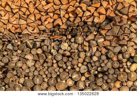 Closeup of stacked wood at a sunny day