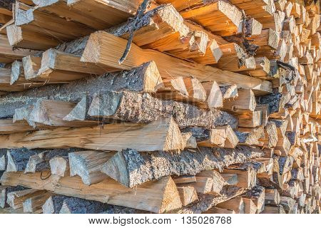 Closeup of stacked wood at a sunny day