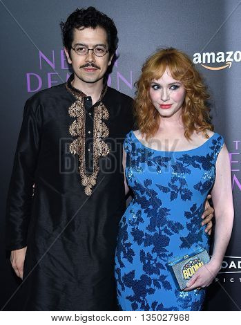 LOS ANGELES - JUN 14:  Christina Hendricks & Geoffrey Arend arrives to the 'The Neon Demon' Hollywood Premiere  on June 14, 2016 in Hollywood, CA.                