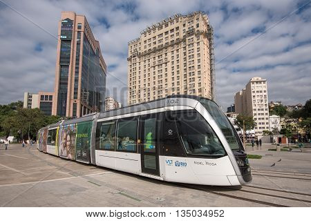 Rio de Janeiro, Brazil - June 13, 2016: New city tram VLT passing Maua Square. Recently inaugurated, it is the newest mode of public transportation, and is free of charge for the first weeks of use.