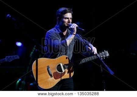 NEW YORK-APR 30: Chris Carmack performs onstage during the 'Nashville' Tour at The Beacon Theatre on April 30, 2015 in New York City.