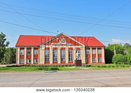 The town of Kargat Kargatskiy rayon Novosibirskaya oblast Siberia Russia - June 12 2016: the house of culture named after Maxim Gorky