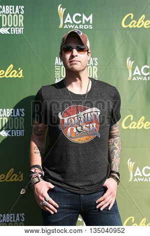 ARLINGTON, TX - APR 18: Recording artist Austin Webb attends the ACM & Cabela's Great Outdoor Archery Event at the Texas Rangers Youth Ballpark on April 18, 2015.