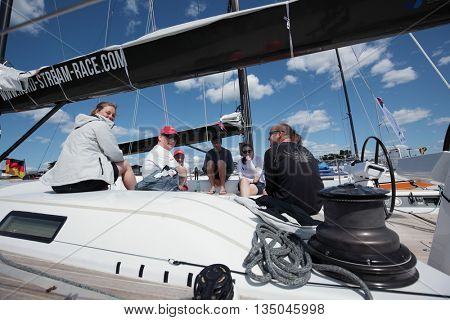 ST. PETERSBURG, RUSSIA - JUNE 4, 2016: British team on the yacht Petite Flamme in the day of the opening ceremony of the Nord Stream Race. Five teams compete in the race this year