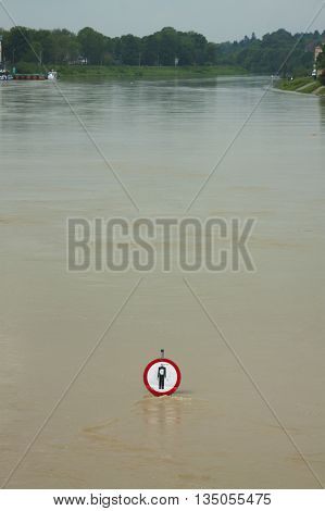 Polnad Kraków flooded Vistula/Wisła river embankments no entry sign over the water
