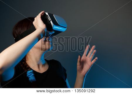 Woman using the virtual reality headset