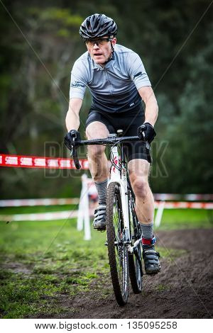 MELBOURNE, AUSTRALIA - JUNE 20: Competitors compete in Rnd 1 of the Dirty Deeds Cyclocross Series 2016