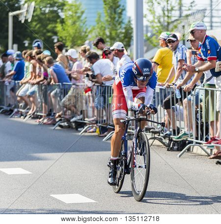 Utrecht, Netherlands - 04 July 2015: The French cyclist Jerome Coppel of IAM Cycling Team riding during the first stage (individual time trial ) of Le Tour de France 2015 in Utrecht Netherlands on 04 July 2015.