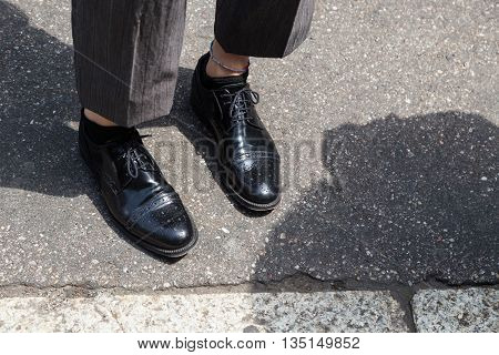 MILAN ITALY - JUNE 18: Detail of shoes outside Marni fashion show building for Milan Men's Fashion Week on JUNE 18 2016 in Milan.