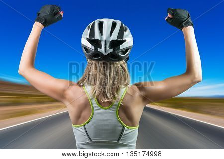 Excited cyclist enjoying the win. Concept Winning in sports.
