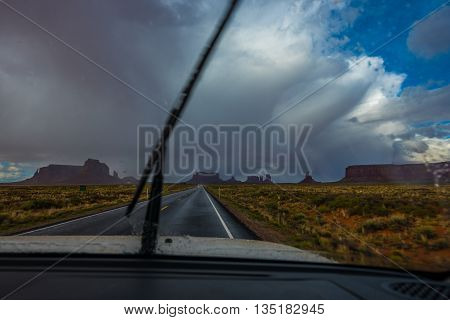 View from inside the car towards the Forrest Gump Point Monument Valley