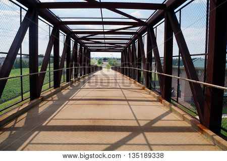 The IL 59 Ped/Bike Bridge allows pedestrians and cyclists safely to cross Highway 59 in Naperville, Illinois.