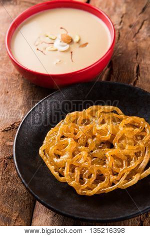 jalebi with rabdi made from condensing milk, famous dessert sweet from India