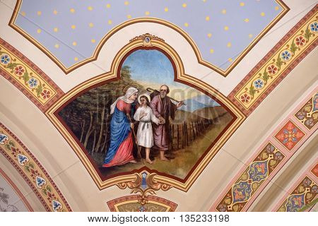 STITAR, CROATIA - AUGUST 27: Holy Family, fresco in the church of Saint Matthew in Stitar, Croatia on August 27, 2015