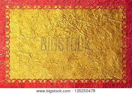 Shiny red frame with a pattern on the gold foil background.