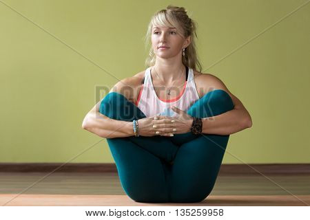 Garbha Pindasana Yoga Pose