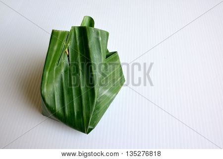 A cute thailand Dessert in banana leaf