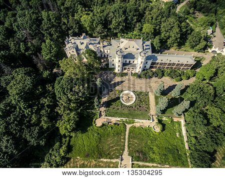 beautiful aerial view on White Swan palace and yard in Sharivka park, Kharkiv region, Ukraine