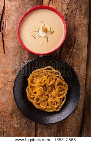 jalebi with rabdi made from condensing milk, famous dessert sweet from India