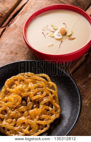 jalebi with rabdi made from condensing milk, famous dessert sweet from India