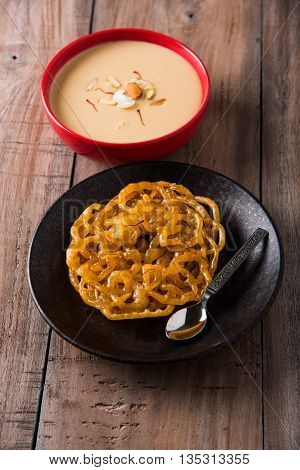 jalebi with rabdi made from condensing milk, famous dessert sweet from India