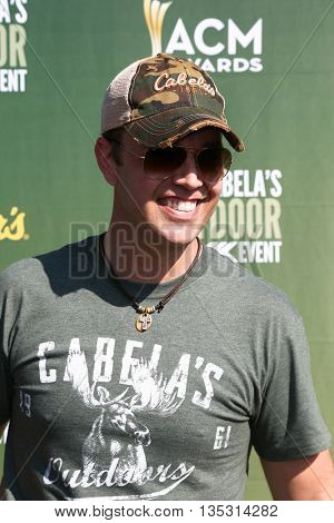 ARLINGTON, TX - APR 18: Lucas Hoge attends the ACM & Cabela'??s Great Outdoor Archery Event during the 50th Academy Of Country Music Awards at the Texas Rangers Youth Ballpark on April 18, 2015.