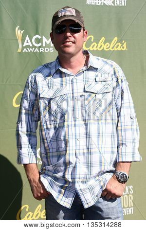 ARLINGTON, TX - APR 18: Singer Casey Donahew attends the ACM & Cabela'??s Great Outdoor Archery Event at the Texas Rangers Youth Ballpark on April 18, 2015.