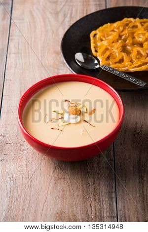 jalebi with rabdi made from condensing milk, famous dessert sweet from India