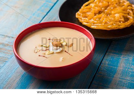 jalebi or imarati with rabdi made from condensing milk, famous dessert sweet from India