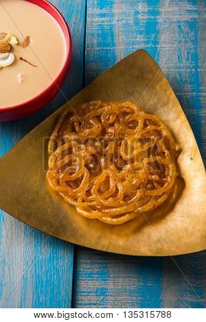 jalebi or imarati with rabdi made from condensing milk, famous dessert sweet from India