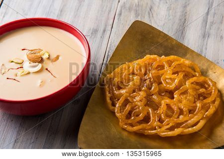 jalebi or imarati with rabdi made from condensing milk, famous dessert sweet from India