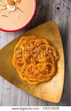 jalebi or imarati with rabdi made from condensing milk, famous dessert sweet from India