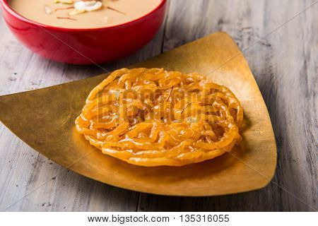 jalebi or imarati with rabdi made from condensing milk, famous dessert sweet from India
