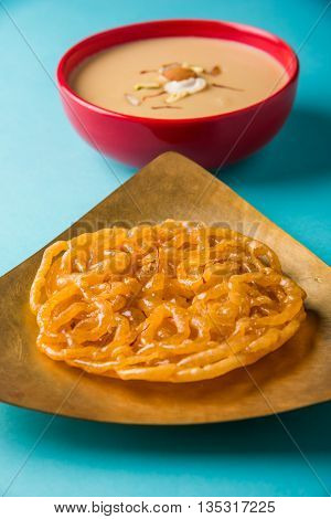 jalebi or imarati with rabdi made from condensing milk, famous dessert sweet from India