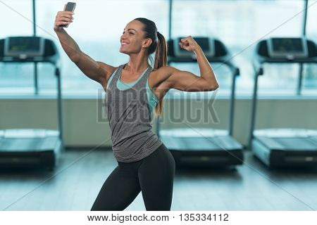 Girl Taking Selfie Picture In Gym