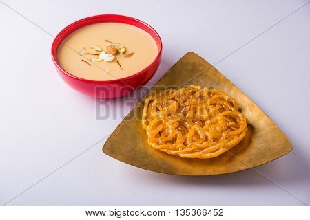 jalebi or imarati with rabdi made from condensing milk, famous dessert sweet from India