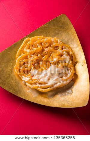 jalebi or imarati with rabdi made from condensing milk, famous dessert sweet from India