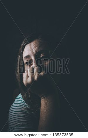 woamn duffering from Fear, loneliness, depression, abuse, addiction