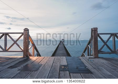 jetty at the beach when sunset golden hours