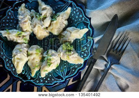 made of cooked dough with meat stuffing dumplings Azerbaijan