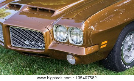 GROSSE POINTE SHORES MI/USA - JUNE 19 2016: A 1971 Pontiac GTO car at the EyesOn Design car show, held at the Edsel and Eleanor Ford House, near Detroit, Michigan.